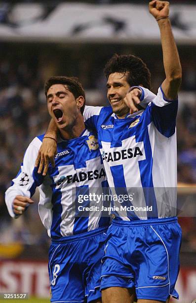 Juan Valeron of Deportivo celebrates his goal with Victor during the UEFA Champions League match between Deportivo La Coruna and AC Milan at the...