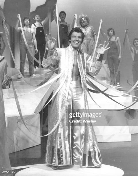 English singer and actor Jess Conrad rehearsing for his role in Andrew Lloyd Webber and Tim Rice's musical 'Joseph and the Amazing Technicolour...