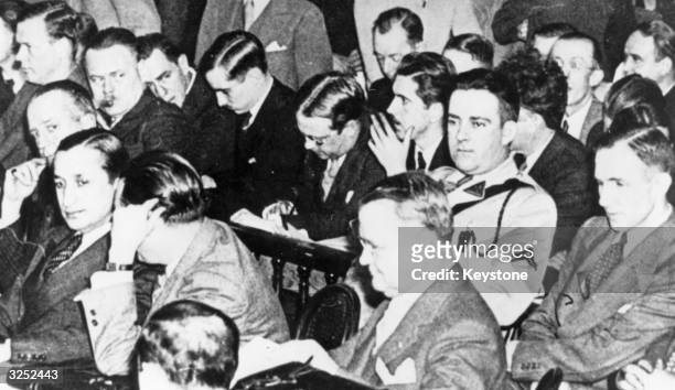 Charles Augustus Lindbergh the aviator, attends the court case in which Bruno Richard Hauptmann is accused and found guilty of kidnapping and...