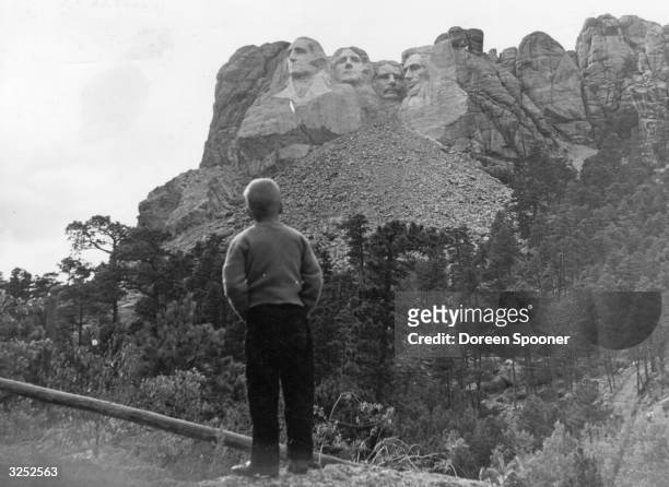 The granite carved faces of American presidents at Mount Rushmore attracts thousands of tourists every year to South Dakota.