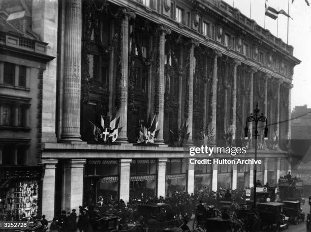 The crowded street outside Selfridges Store in Oxford Street, London, on its opening day.