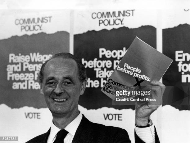 John Gollan, General Secretary of the British Communist Party, with the Party's manifesto, at a press conference in London.