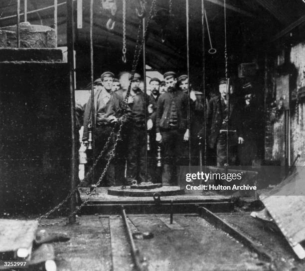 Rescue party waiting to descend the mine shaft in the worst Welsh mining disaster for 11 years at the Wattstown Colliery in the Rhondda Valley....