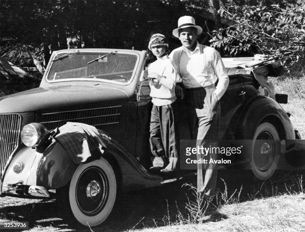 American actor Ryan O'Neal with his daughter Tatum, who is about to appear alongside her father in her first film 'Paper Moon'.