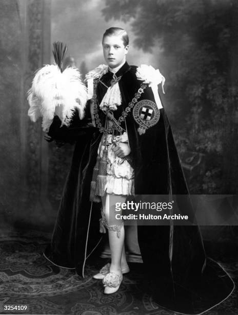 Edward VIII, , who ascended the British throne in January 1936 and abdicated in December 1936, dressed in ceremonial robes at his investiture as a...