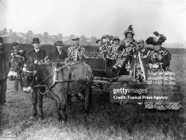 Costers dressed up in Kensal Rise, London.