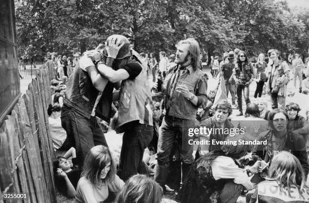 Hell's Angels kissing at a free pop concert held in Hyde Park, London in 1970.