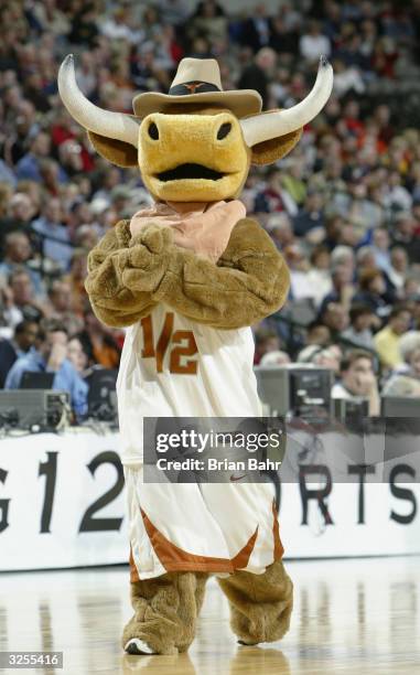 The University of Texas at Austin Longhorns mascot, Hookem, entertains the fans during the quarterfinals of the Phillips 66 Big 12 Tournament against...