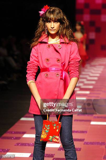 Model Schneider presents a creation by Mercearia as part "Pret a Porter Brazil 2004" - Sao Paulo Fashion Week in Sao Paulo, Brazil, March 04, 2004.