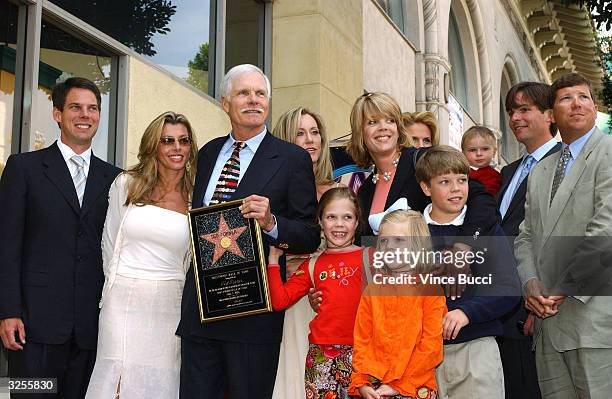 Media magnate Ted Turner and family attend the ceremony honoring him with a star on the Hollywood Walk of Fame April 7, 2004 in Hollywood, California.