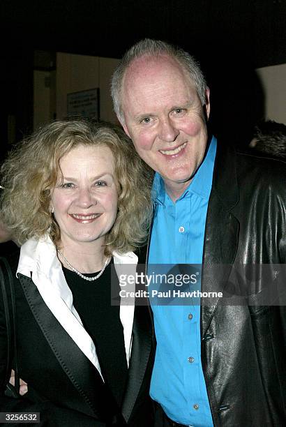 Actor John Lithgow with his wife Mary Yeager pose for a photo during a reception for the opening night of "Mrs. Farnsworth", April 7, 2004 in New...
