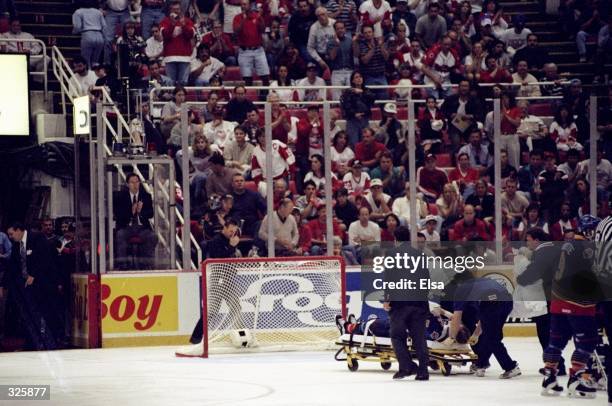 Defenseman Chris Pronger of the St. Louis Blues receives medical attention on the ice after his heart stopped during a game against the Detroit Red...