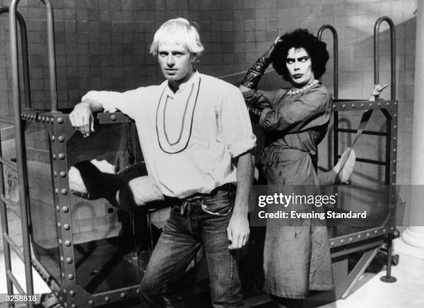 Tim Curry and Peter Hinwood play alien transvestite inventor Frank N Furter and his creation Rocky in Richard O'Brien's cult musical 'The Rocky...