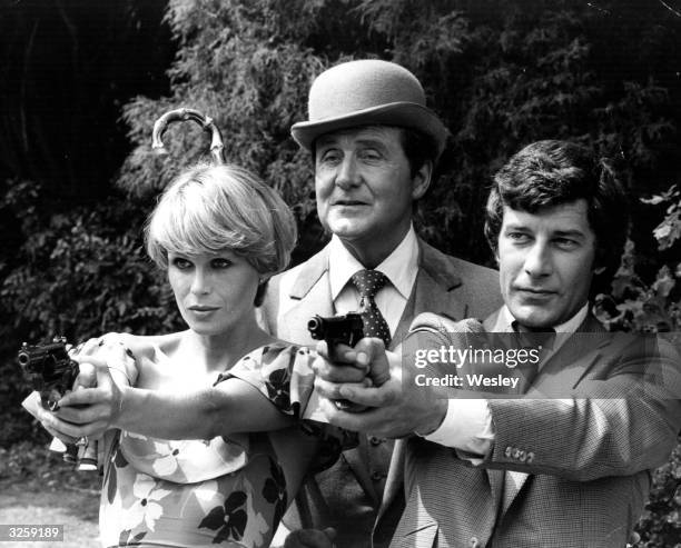 The three main characters in the television series 'The New Avengers', together at Pinewood Studios. From left, Joanna Lumley as Purdey, Patrick...