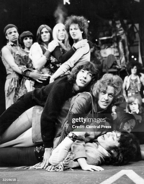 Members of the London cast of the musical 'Hair', during a rehearsal at the Shaftesbury Theatre. From top to bottom they are: Paul Burns, Jonathan...