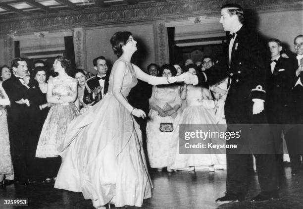 Crown Prince Constantine dances a Cha-Cha with a young woman at the annual Royal Ball, attended by all the Greek Royal Family members at the...