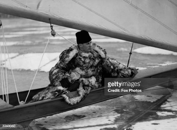 Crown Prince Olaf of Norway using his ice yacht on Stora Vartan, a bay north of Stockholm.
