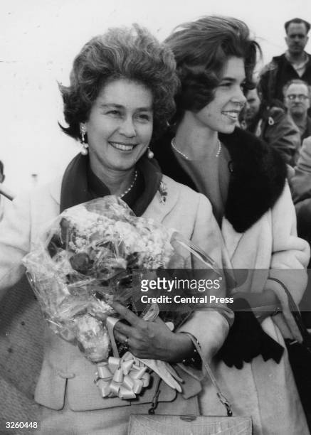 Queen Frederika, wife of King Paul of Greece and Princess Irene of Greece as they leave London airport on their way home.