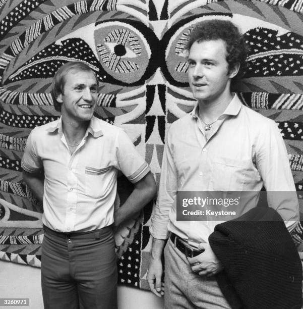 Dennis Tueart, a former Manchester City Football Club player, and Franz Beckenbauer, the former West German national team captain, on their arrival...