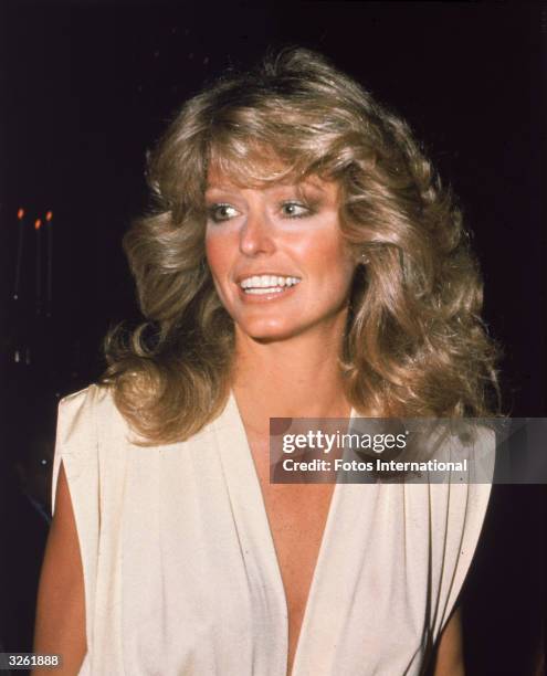 American actress Farrah Fawcett arrives at the Golden Globe Awards Ceremony at the Beverly Hilton Hotel, Beverly Hills, California, January 1977.
