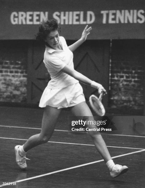 British tennis player Jo Durie in action against Anthia Cooper at the Green Shield British Indoor Junior Tennis Championships at Queen's Club.