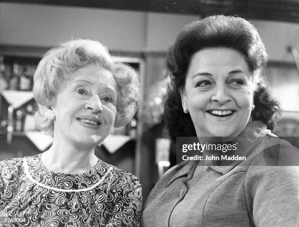 Actress Doris Speed as Annie Walker and Betty Driver as Betty Turpin in the television series 'Coronation Street'.