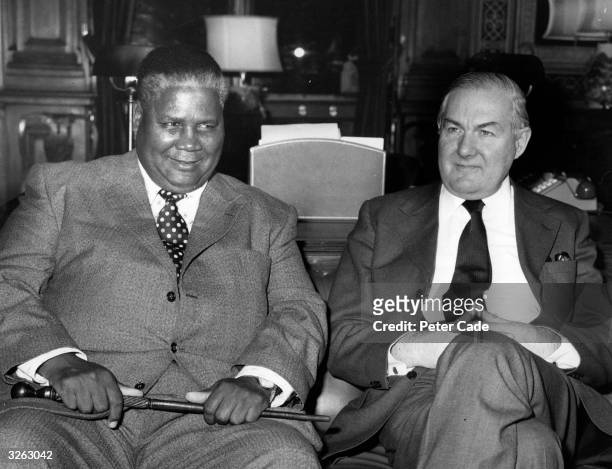 Black Rhodesian leader Joshua Nkomo in London to discuss the latest moves for a settlement in Rhodesia , meets James Callaghan for talks at the...