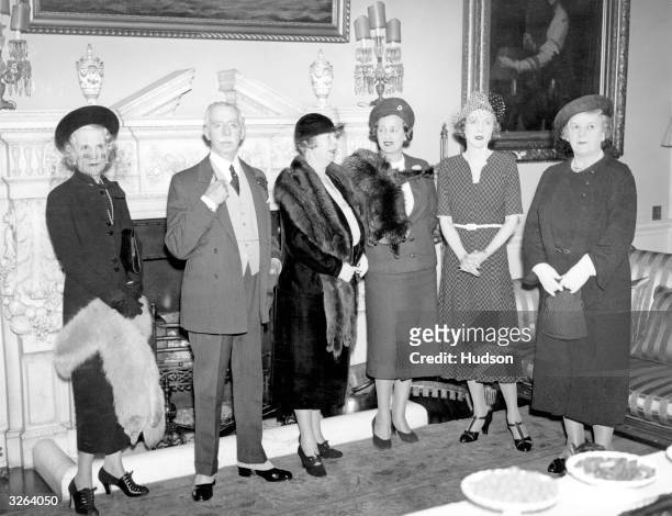 Lady Diana Cooper , the wife of Sir Alfred Cooper, giving a sherry party at Admiralty House for the committee on the Waifs and Strays Ball to be held...