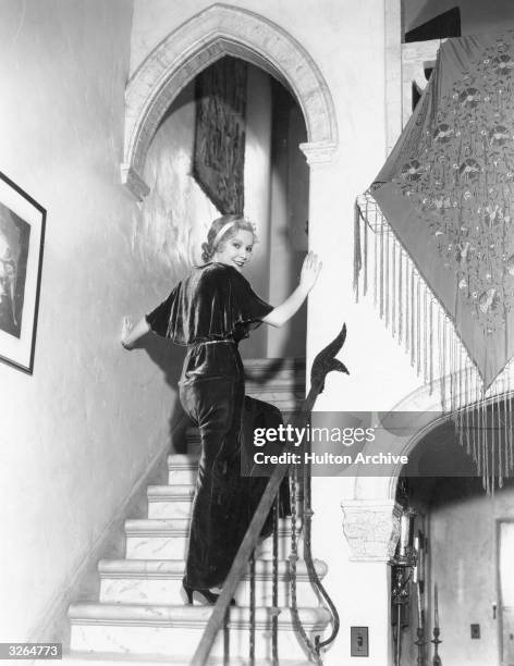 June Clyde, the Hollywood actress, 'at home' to the Press.