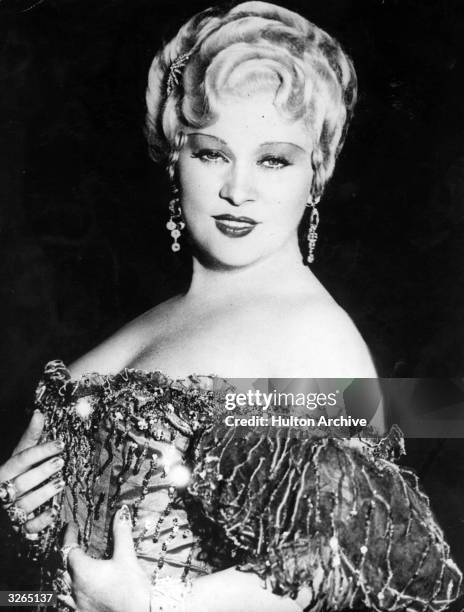 American film actress & sex symbol, Mae West .
