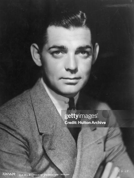 American film star William Clark Gable , who portrayed Rhett Butler in 'Gone With The Wind'. He received an Academy Award in 1934, and was crowned...