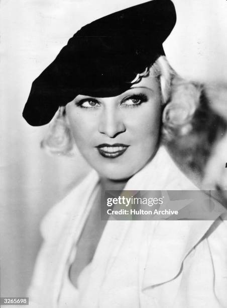 Mae West in her prime, an American leading lady and the archetypal sex symbol who was vulgar, mocking, overdressed and endearing. She wrote her own...