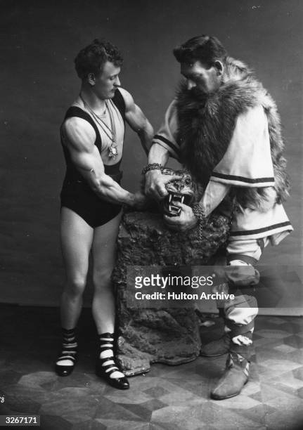 German body builder and strongman Eugen Sandow , with a former stone quarryman, who performed under the stage stage name, 'Goliath' 1890. The pair...