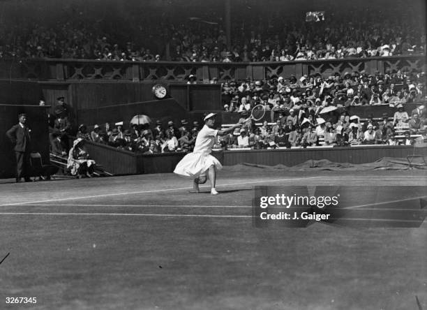 German tennis player Cilly Aussem in action on her way to winning the women's singles final against Hilde Krahwinkel of Germany at Wimbledon.