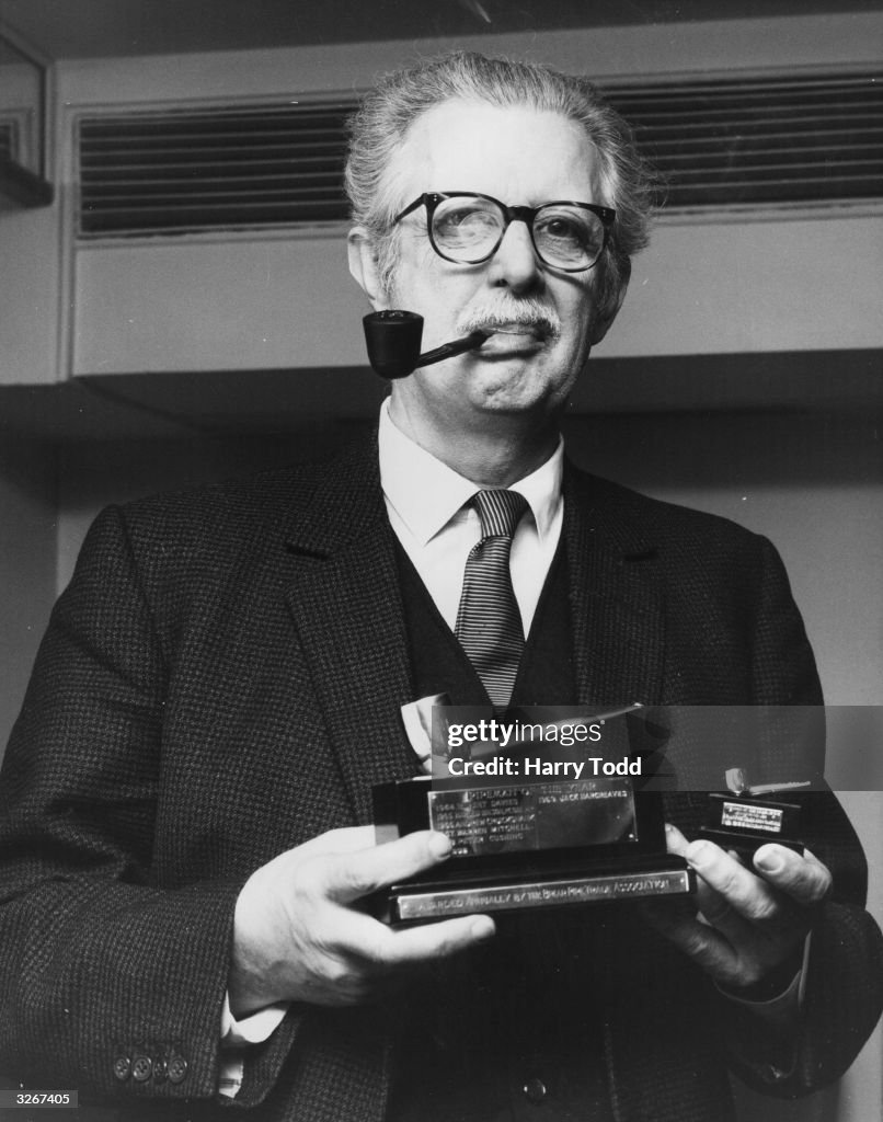 Jack Hargreaves, television presenter, with his award as 'Pipeman of... News Photo Getty Images