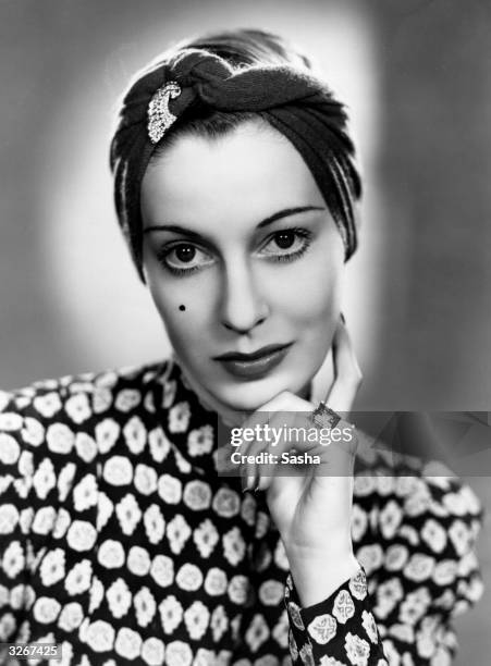 British actress Valerie Hobson plays Jill Blacklock in 'The Spy In Black', a Columbia thriller directed by Michael Powell. The film was released in...