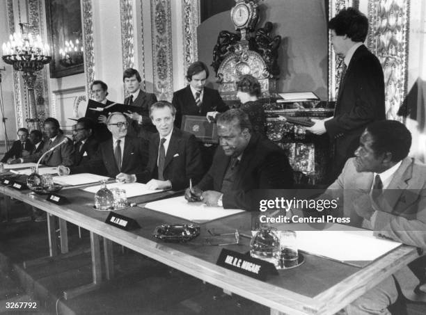 The leaders of the Patriotic Front, Robert Mugabe and Joshua Nkomo, Lord Carrington the British Foreign Secretary, Sir Ian Gilmore and Bishop Abel...