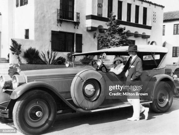 Renee Adoree formerly Jeanne De La Fonte, the French leading lady and former circus bareback rider who was contracted to MGM. She is sitting at the...