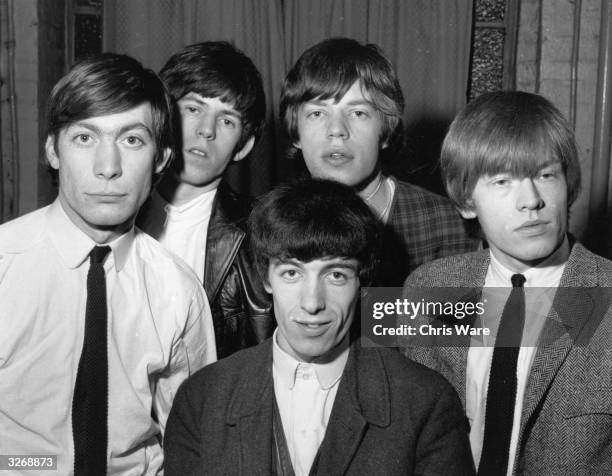 British rhythm and blues group The Rolling Stones, from left to right; Charlie Watts, Keith Richards, Bill Wyman , Mick Jagger and Brian Jones .