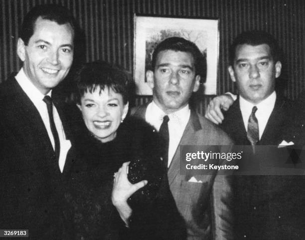American actress Judy Garland and her husband Mark Herron visit East End gangsters the Kray twins whilst in London with Chris Allen.