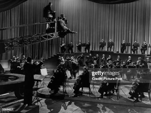 The London Symphony Orchestra, conducted by Sir Malcolm Watts Sargent features in the Crown Film Unit Production 'Instruments Of The Orchestra'....