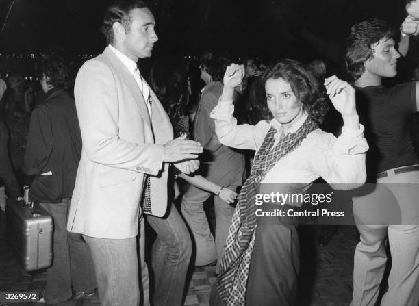 Margaret Trudeau, former first-lady of Canada, now an aspiring actress, enjoys a dance at New York's famous Studio 54 discotheque, with her latest...