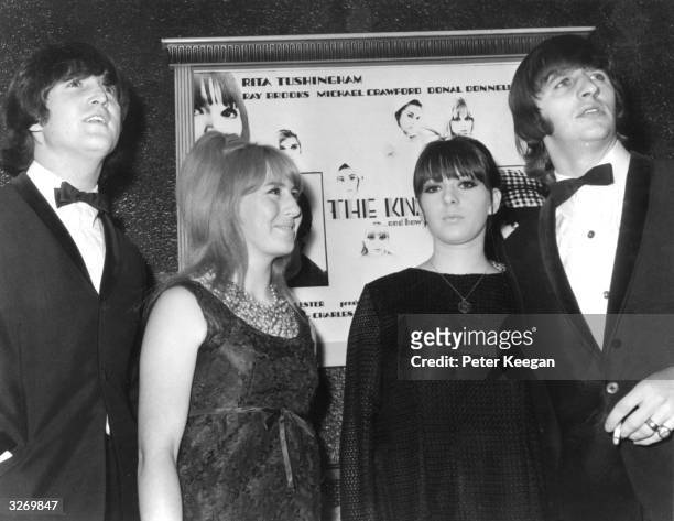 Beatles singer, songwriter and guitarist John Lennon , left, and drummer Ringo Starr, right, with their respective wives Cynthia, centre left, and...