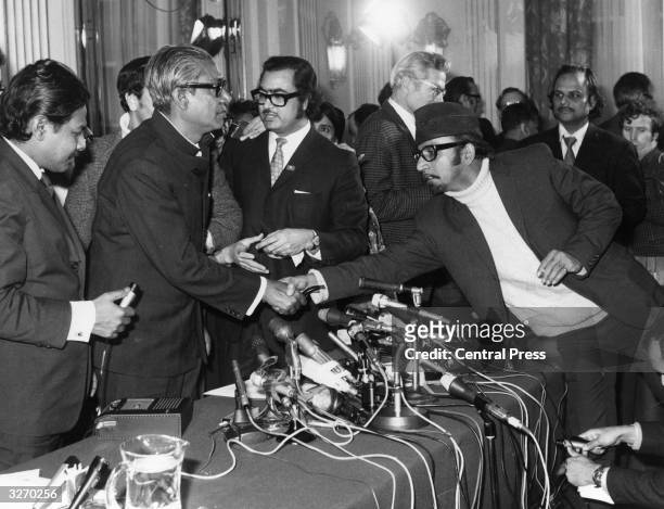 Sheik Mujibur Rahman, Bangladesh leader, in London having been released from prison in West Pakistan, shaking hands with well wishers.