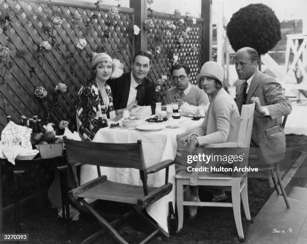 Marion Davies , the American leading lady is lunching with William Haines the American leading man, Eileen Percy, Ulric Bush and King Vidor the...