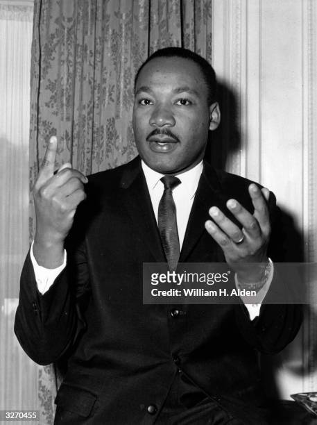 American civil rights campaigner Martin Luther King Jr at a press reception at the Savoy Hotel in London on 21st September 1964.