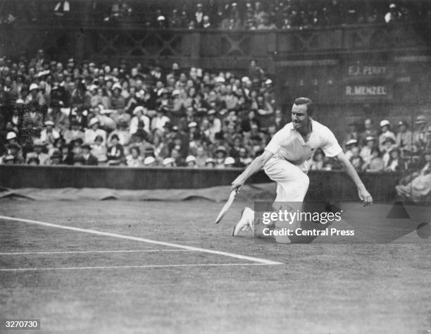 British tennis player Fred Perry in action against Roderick Menzel at Wimbledon.