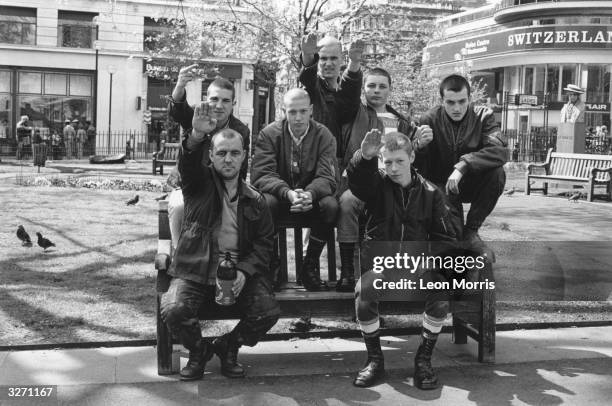 Group of skinheads giving the Nazi salute in Leicester Square, London.