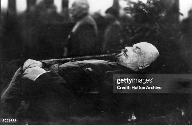 Vladimir Ilyich Lenin lying in state in the Kremlin.