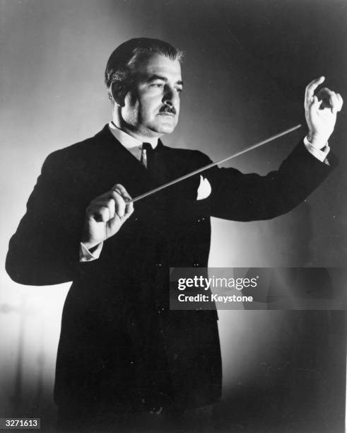 Conductor Arthur Fiedler conducting a Boston 'Pops' concert.